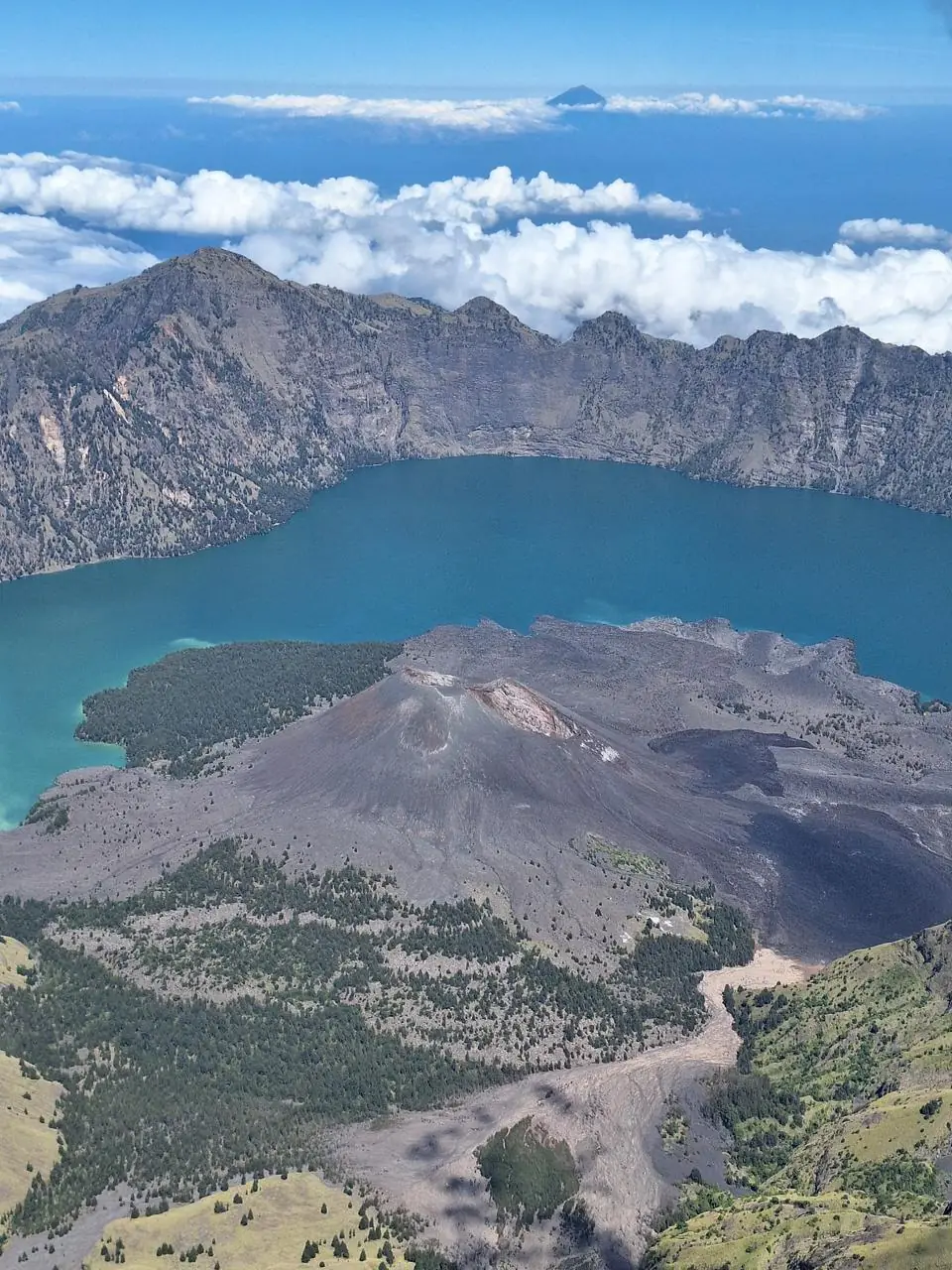 Segara Anak crater lake and Barujari volcano inside the Mount Rinjani caldera